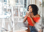 Coffee shop, thinking and happy black woman in cafe drinking espresso or cappuccino while doing remote work on laptop. Freelance female with drink for motivation, idea and wifi for blog in London