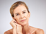 Skincare, beauty and cosmetics for senior woman with dermatology, antiaging and wellness routine against studio background. Lady portrait for wellness, health and facial botox for wrinkle free skin