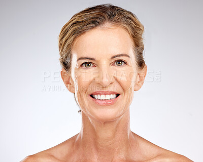 Buy stock photo Face, beauty and skincare with senior woman happy with dermatology skin routine against mockup studio background. Cosmetics, antiaging and smile of lady posing for health, self love and wellness