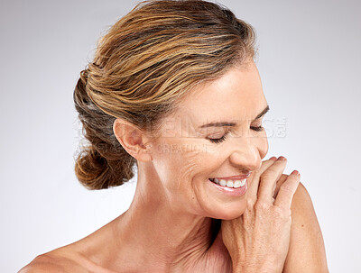 Buy stock photo Skincare, beauty and happiness of senior woman with confidence, elegant and loving body. Dermatology, skincare products and old woman in studio for spa, skin wellness and anti aging beauty products