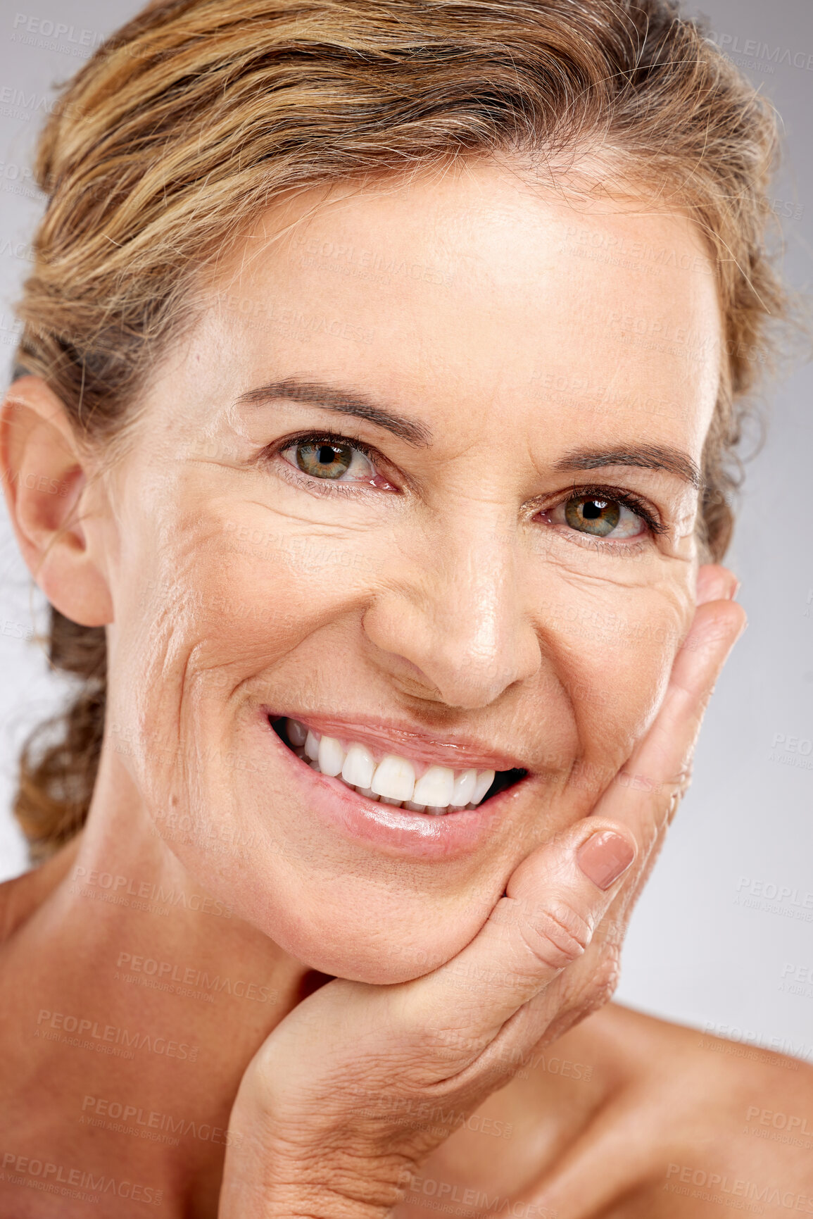 Buy stock photo Skincare, beauty and face of happy senior woman after dermatology facial routine against studio background. Cosmetics, antiaging and lady smile for wellness, self love and health of skin after botox
