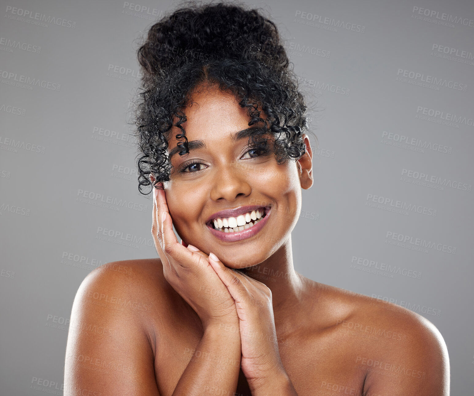 Buy stock photo Beauty, portrait and black woman with hand pose for natural  hair care advertising with smile. Happy model with healthy and shiny curly hair for cosmetic marketing with grey studio mockup.