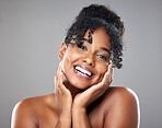Beauty, black and woman with natural curly hair and glowing skin isolated on studio background. African american model, smooth skin and happy for cosmetic, face and skin health. and wellness.  