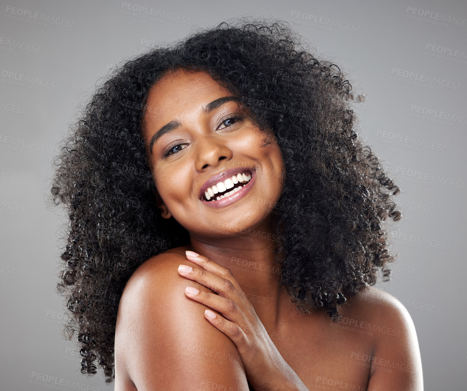 Buy stock photo Face, beauty and skincare with a model black woman in studio on a gray background with a happy smile. Portrait, cosmetics and wellness with an attractive young female posing to promote a product