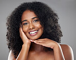 Black woman afro, beauty and smile for skincare, cosmetics or treatment against a grey studio background. Portrait of happy isolated African female smiling with teeth satisfied for perfect skin
