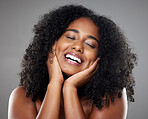 Black woman, skincare model with smile in studio portrait against grey wall background with happiness. Plus size beauty, happy cosmetic woman with glow skin for makeup cosmetics against dark backdrop