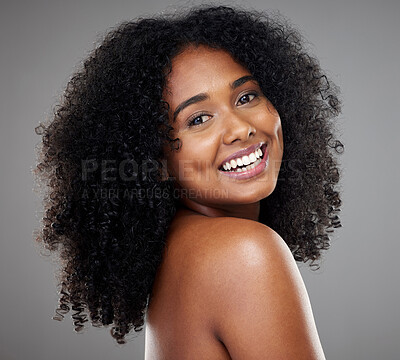Buy stock photo Black woman afro, beauty and smile for skincare, cosmetics or treatment against grey studio background. Portrait of happy isolated African American female smiling with teeth in care for perfect skin