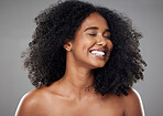 Black woman, smile and natural beauty of a model with skincare, wellness and healthy body. Happy, cosmetic and skin health of a person with an afro feeling happiness and content smiling with joy