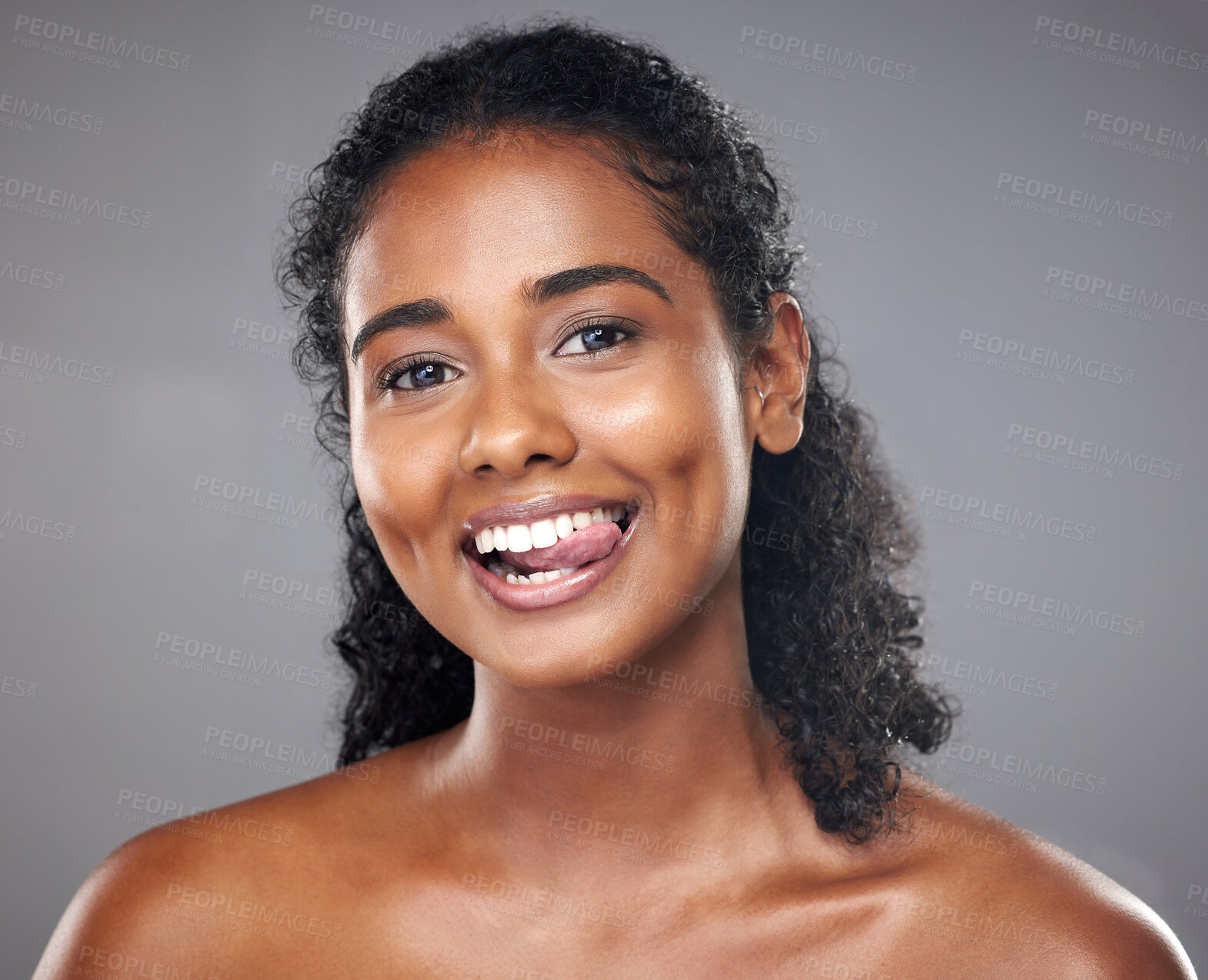 Buy stock photo Happy black woman, face portrait and tongue out for healthy skincare morning routine. Beautiful young african girl, smile and fun cosmetic beauty wellness lifestyle or natural care in studio