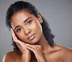 Face makeup, creative portrait and indian woman with glow from cosmetics against a mockup studio background. Portrait of model with beauty from cosmetic smooth and clean body care with mockup space