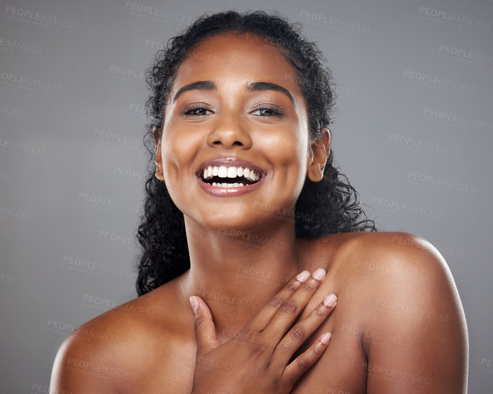 Buy stock photo Skincare, beauty and portrait of a happy woman in a studio with a cosmetic makeup routine. Happiness, facial and natural face of a young model with a smile from Mexico isolated by a gray background.