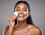 Skincare, beauty and portrait of black woman with cotton pad to cleanse face. Beauty products, facial and girl clean makeup, cosmetics and skincare products for healthy skin, wellness and body care