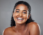 Black woman, beauty and smile with teeth for skincare, makeup or cosmetics against a grey studio background. Portrait of happy African American model smiling in satisfaction for dental treatment