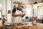 Senior man, retirement and cooking in kitchen, smartphone and search internet for food recipe, technology and online connection. Healthy diet, chef skill development and research meal ideas.