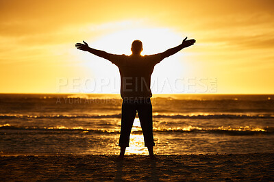 Buy stock photo Beach, sunset and silhouette of man in nature with arms to the sky carefree while on vacation. Freedom, shadow and guy standing outdoor by sea or ocean on holiday, adventure or journey in Australia.