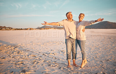 Buy stock photo Love, beach and summer with a senior couple standing together on the sand on a sunny day. Travel, vacation and romance with a n elderly man and woman pensioner enjoying their retirement in nature