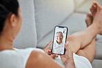 Video call, smartphone and a woman on sofa talking to happy elderly man on screen in living room. Technology, communication and love connection, relax and chat on video phone call using mobile app.