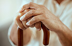 Senior man hands, walking stick and disability, retirement and osteoporosis, arthritis and injury. Wooden cane of elderly, disabled and old patient support, healthcare and sick help in nursing home
