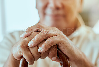 Buy stock photo Senior man, hands and cane for disability, arthritis or osteoporosis in home. Closeup, retirement and disabled elderly male holding wooden walking stick for support, aging or help and assistance.