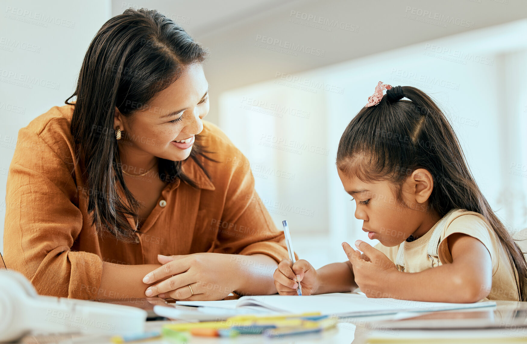 Buy stock photo Home school girl, mother and education, learning and studying, writing books and drawing in Colombia house. Young student development, kids growth and mom parent teaching, helping tutor and knowledge