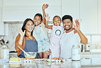 Family, love and baking together in kitchen with smile, happy and wave with ingredients on counter or table. Portrait of girl kids, mother and father enjoy cooking or bake while bonding in home