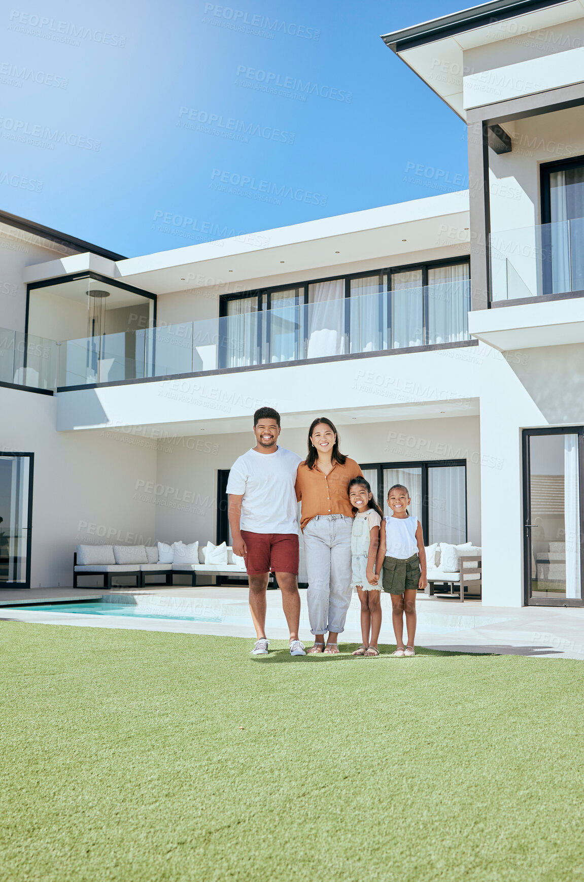 Buy stock photo Portrait, real estate and happy family moving into their new luxury home, house or property in summer. Happy parents and children standing with a smile outdoor with building investment or purchase