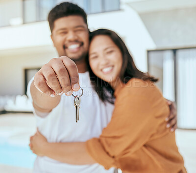 Buy stock photo House keys, new home and couple real estate property for sale, buying and rent on home loan, building mortgage and investment. Hands of happy man, woman portrait and homeowner moving to neighborhood 