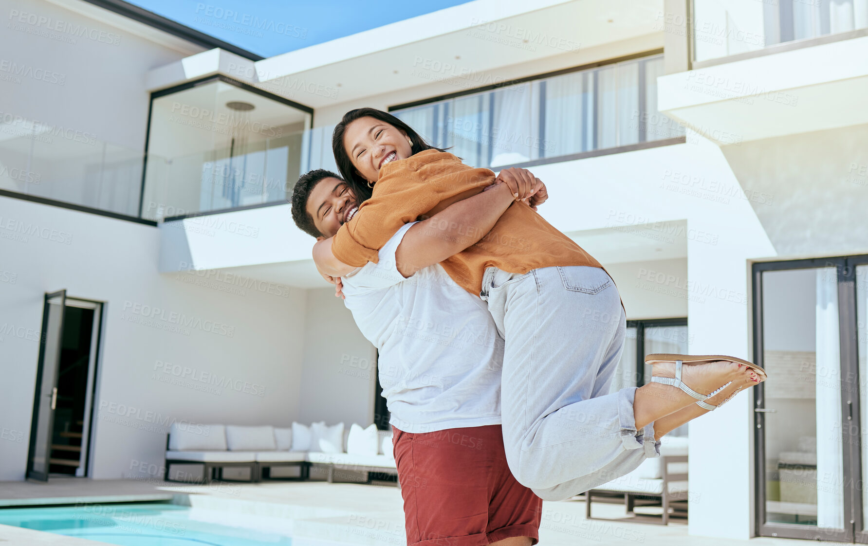 Buy stock photo Hug, real estate and couple moving into their new home while excited, happy and with smile together. Portrait of a young, hugging and man and woman with love and happiness at their dream house