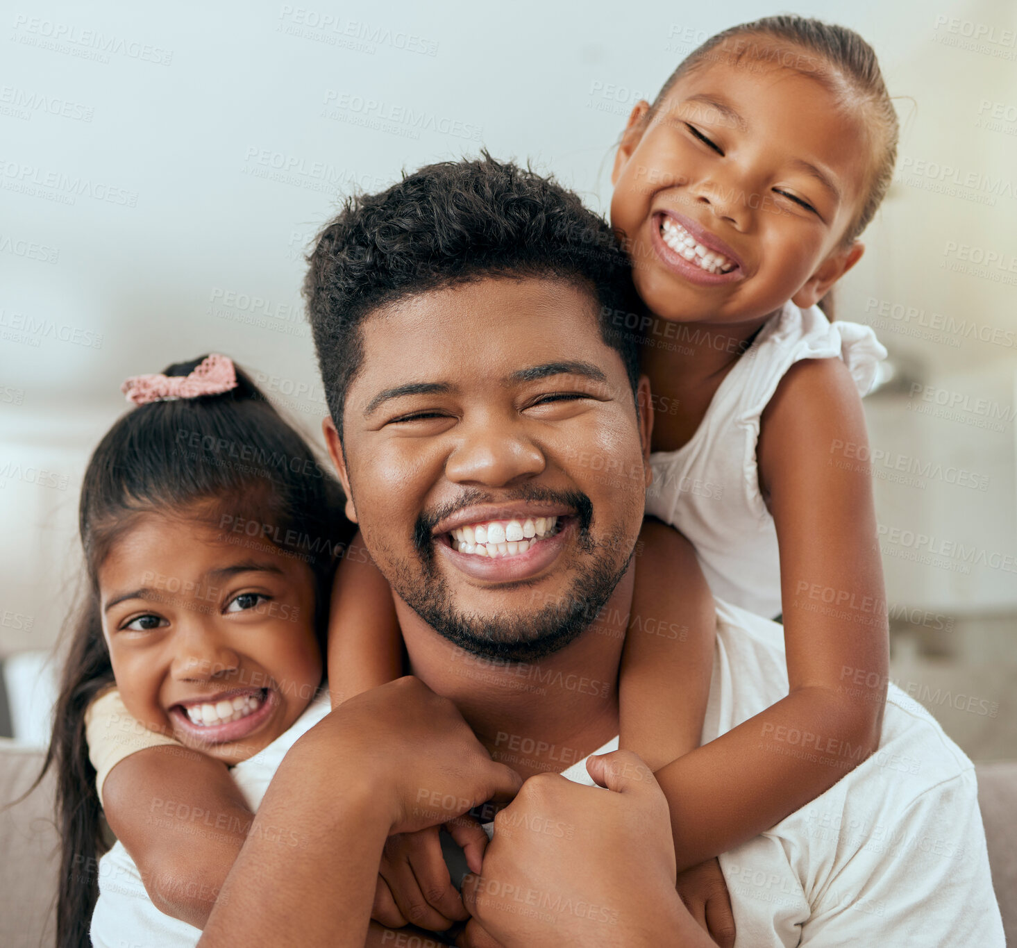 Buy stock photo Family, father and children, hug and happy together in portrait at family home while spending quality time. Filipino man, girl and smile, kids and dad hugging, bonding and parenthood, childhood joy.
