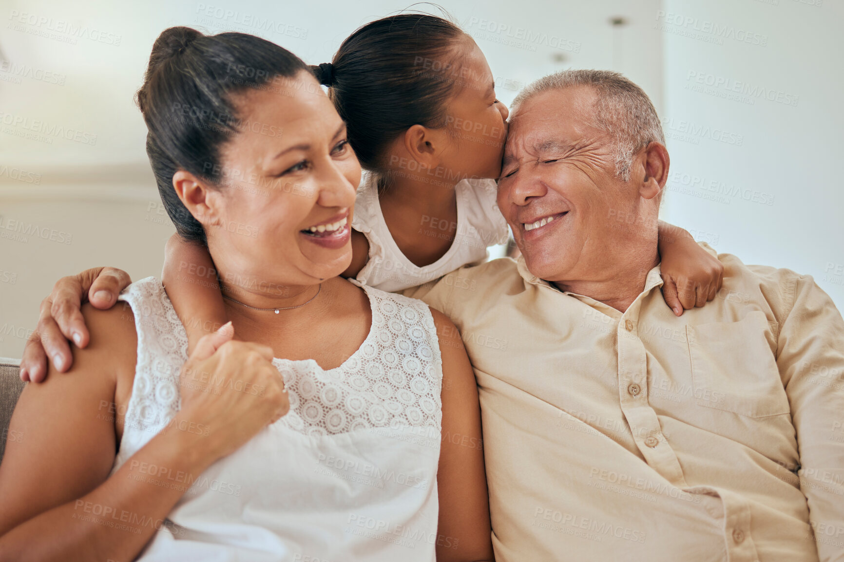 Buy stock photo Happy grandparents, smile with girl, kiss and hug and relax in retirement at house. Senior man, elderly woman and child affection together. Kid on holiday, laugh and happy with senior man and woman
