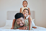Family, children and bed with a man, daughter and sister having fun together in their home while bonding. Bedroom, love and playful with a father and daughter siblings laughing or joking in a house