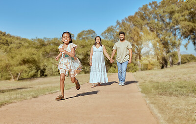 Buy stock photo Family, park and together, nature and outdoor, parents holding hands and girl running, spending quality time outside. Mexican man, woman and child, fun in the sun and bonding, happy and summer.