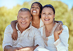 Family, grandparents and girl portrait in nature with smile of grandmother, grandfather and child. Retirement, asian family and care of cute kid in Malaysia with joyful senior grandma and grandpa.

