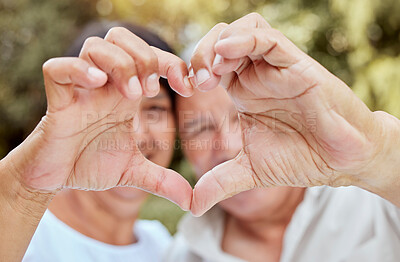 Buy stock photo Heart hands, love and senior couple, happiness and kindness, trust and support in garden park. Closeup marriage, finger shape and celebrate care relationship, anniversary date and relax retirement
