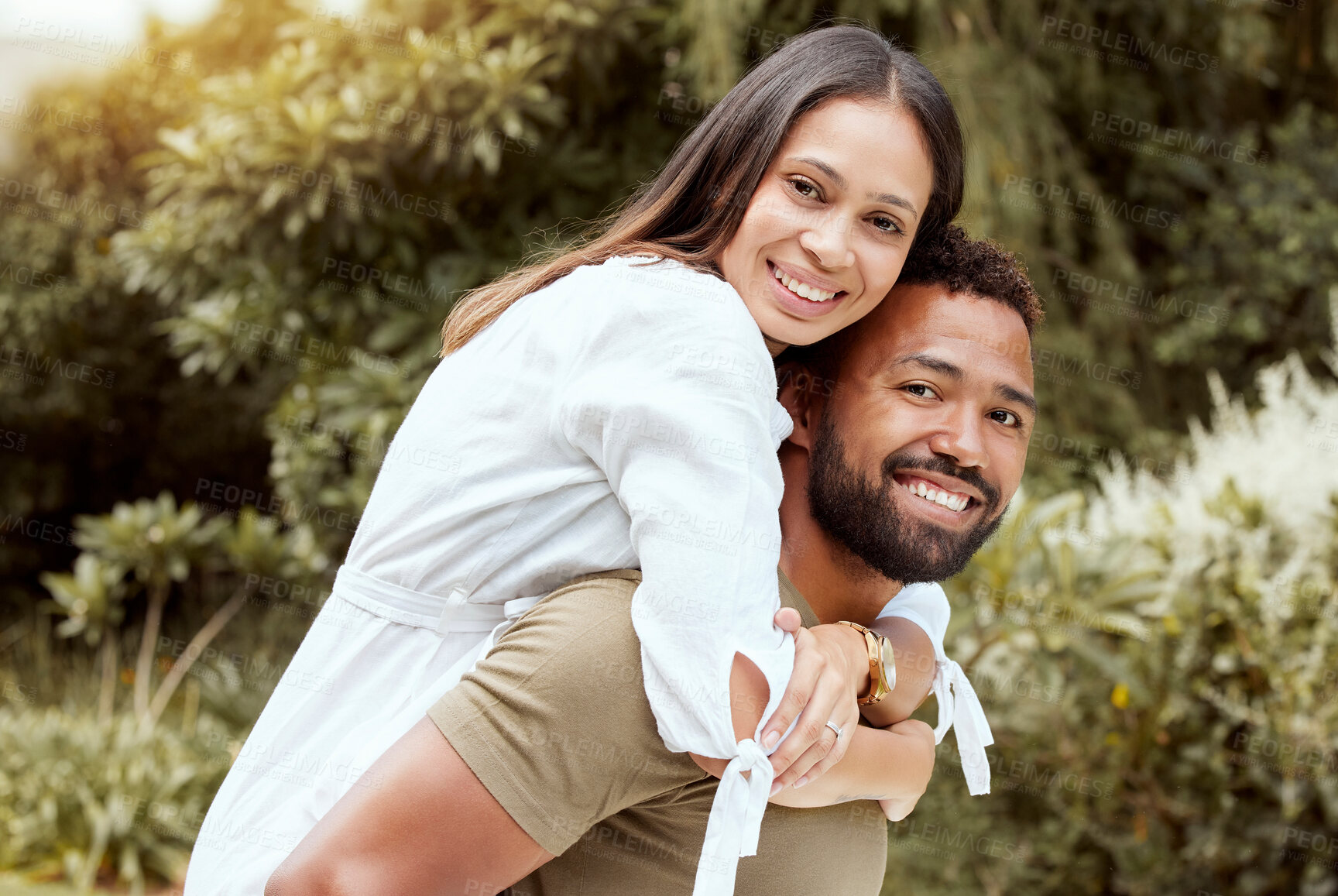 Buy stock photo Love, back and couple in nature for a happy, content and peaceful summer romance on a honeymoon holiday vacation. Smile, relaxed and romantic woman hugging partner with freedom in a natural park