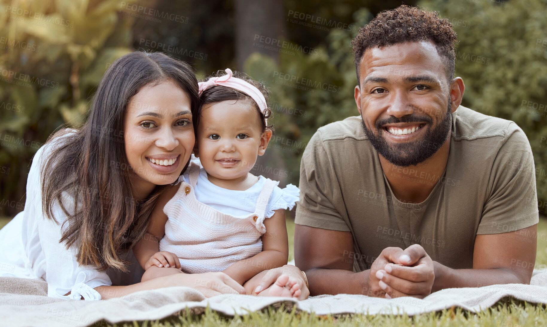 Buy stock photo Black family, parents and baby on a park picnic blanket in nature with a happy smile together, Portrait of a mother, father and girl child with happiness and love spending time together in summer 