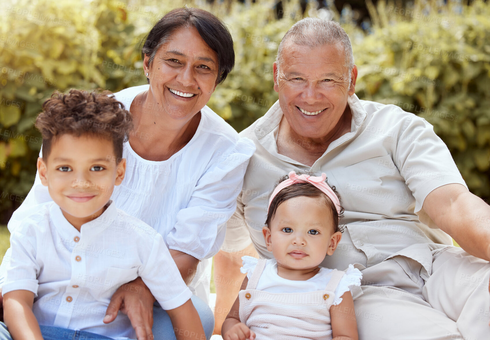 Buy stock photo Family, children and grandparents with a girl and boy spending time together in the garden during a visit. Nature, relax and love with a senior man and woman bonding with their grandkids outdoor