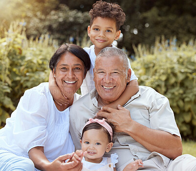 Buy stock photo Family, portrait and children relax with grandparents in a park, happy and smile while sitting nature. Happy family, kids and senior couple in a yard or garden in Mexico, playing and embrace together