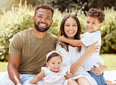 Buy stock photo Family, portrait and picnic in a park with happy, relax and smile people bond on a blanket outdoors. Black family, kids and parents relaxing on grass in the yard, enjoying summer with baby and son