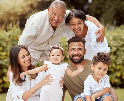 Buy stock photo Big family, portrait smile and fun in nature for quality bonding together at the park in the outdoors. Happy parents, grandparents and kids relaxing in joyful happiness for family time outside