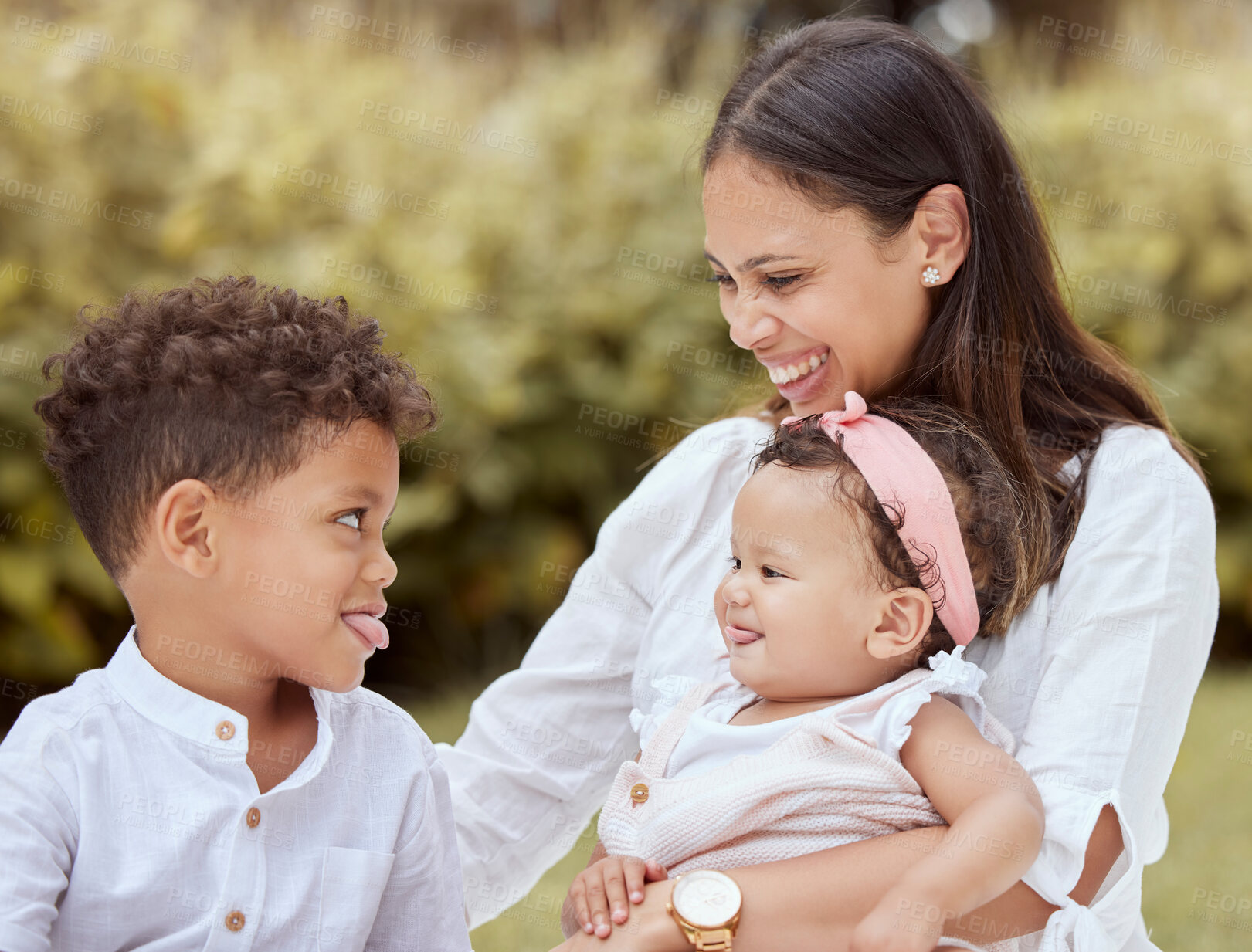 Buy stock photo Family, happy and children with a mother having fun with tongue out gesture in a nature park. Kids, comic and funny quality time of a mom, boy and baby together with happiness, love and youth