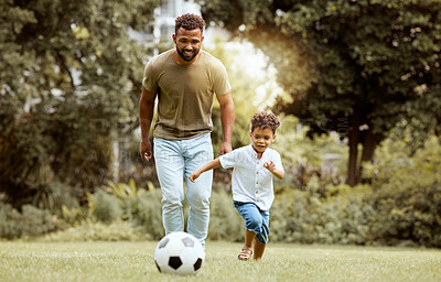 Buy stock photo Father, child and playing with soccer ball in the park for fun quality bonding time together in nature. Dad and kid enjoying family weekend, break or exercise for playful summer of soccer outside