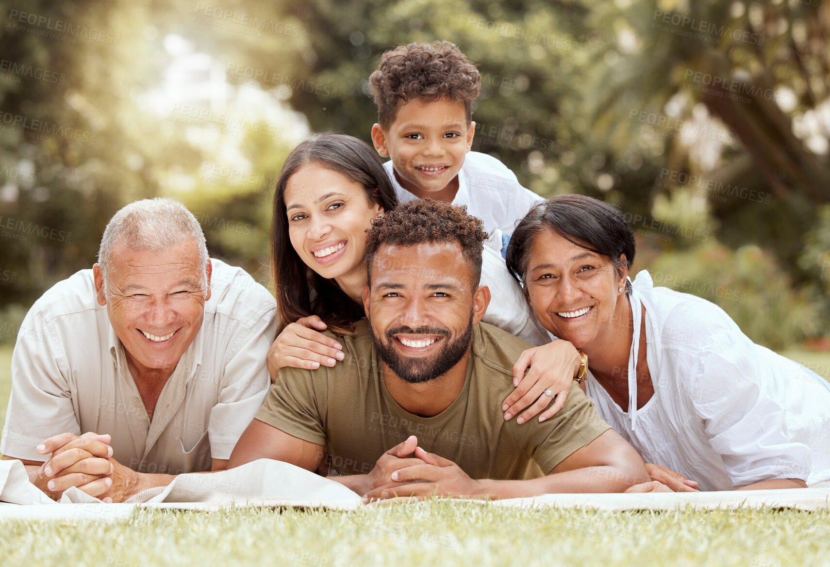 Buy stock photo Black family, happy lying portrait on lawn blanket and summer sunshine in garden together on grass. Mom dad, child grandparents and outdoor happiness, relax on holiday vacation and love bonding time