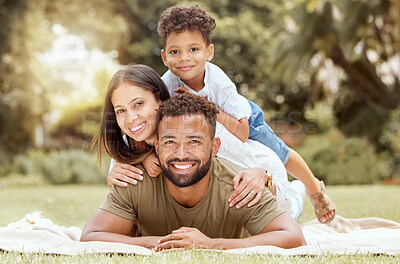 Buy stock photo Relax, smile and picnic with portrait of family in park for summer, happy and nature. Wellness, spring and health with other and father embrace with child in grass field or countryside environment 