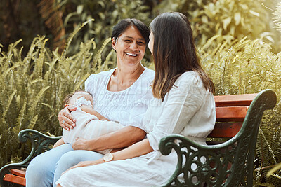 Buy stock photo Family, women and sleeping baby at a park in summer, relax and conversation in nature. Happy family, mother and and elderly woman relaxing on a park bench, laughing and enjoying rest, talking and joy