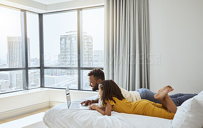 Buy stock photo Video web streaming, computer and father at a hotel with a kid using technology together. Online tv, movie and internet video watching of a dad and young girl on a apartment bedroom bed with a laptop