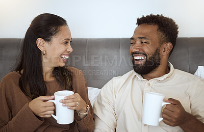Buy stock photo Couple, coffee and laughing people feeling happiness in a home living room lounge sofa. Happy, funny and smile in the morning of a girlfriend and boyfriend together on a house couch with quality time