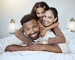Bed, happy family and girl in bedroom, happy and smile while bond, hug and having fun together. Love, portrait and black family of mother, dad and daughter rest, play and enjoy quality time in home