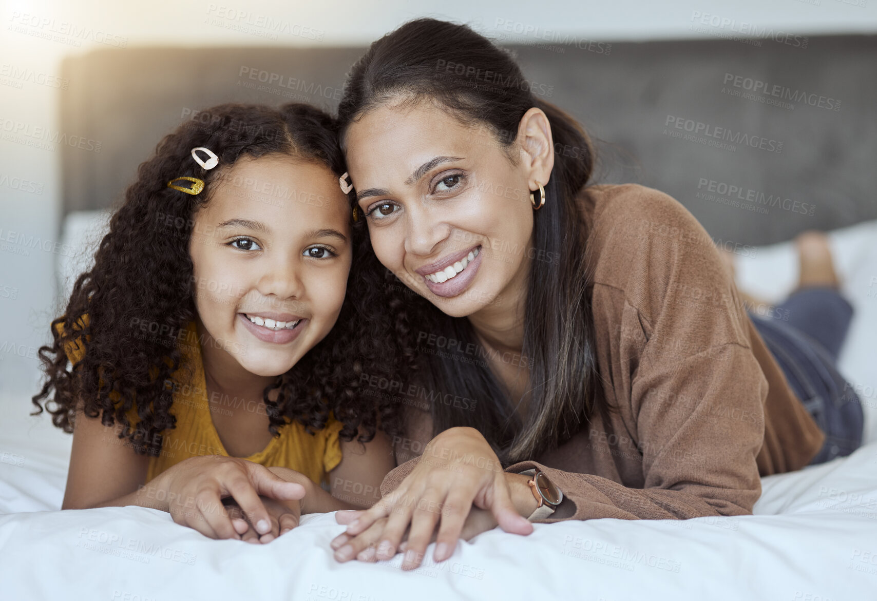 Buy stock photo Mother, girl and happy family home morning on a bedroom bed feeling family love and care. Portrait of a mama and child in a house bonding together with a smile lying with happiness smiling content