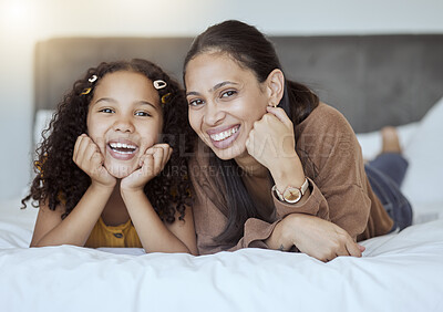Buy stock photo Happy, relax and portrait of mother and girl with smile on the bed in bedroom together in family home. Happiness, love and woman from Mexico laying with her child to rest, relax and bond at the house